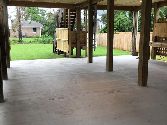 Back yard and parking underneath