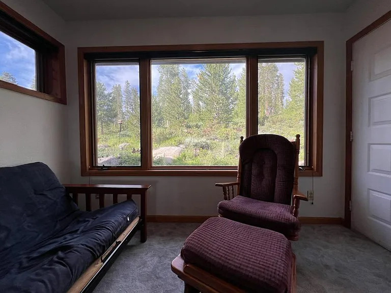 This room is on the main floor and has a private entrance. It does not have a closet, so does not count as a bedroom, but with your own private entrance and private patio overlooking nature it is the best bedroom or office in the house!