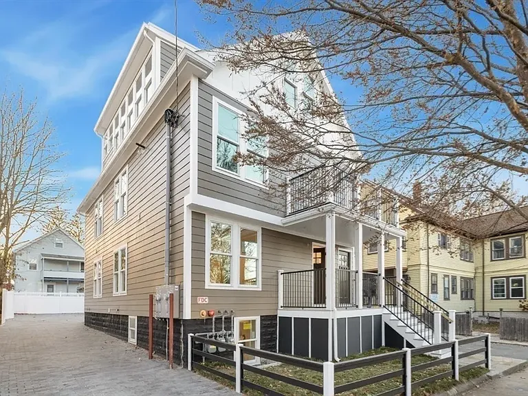 Curb appeal at 157 Boston Ave: A stately, well-maintained residence in the heart of a vibrant neighborhood.