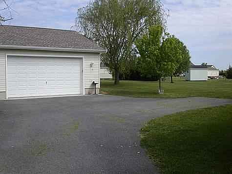 Driveway to detached garage.