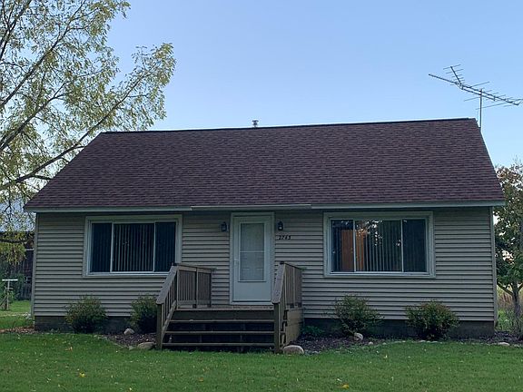 2743 Indian Lakes Rd. Main bedroom (R), living room window (L).