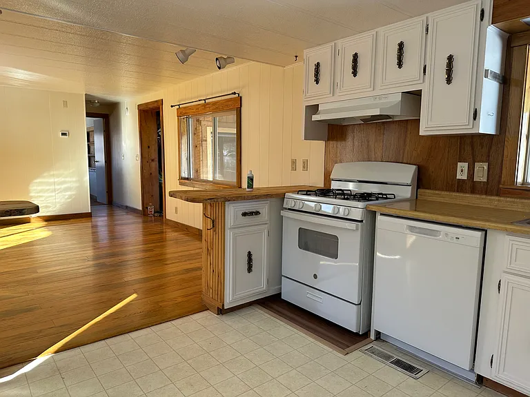 New gas stove and dishwasher. Freshly painted cabinets.