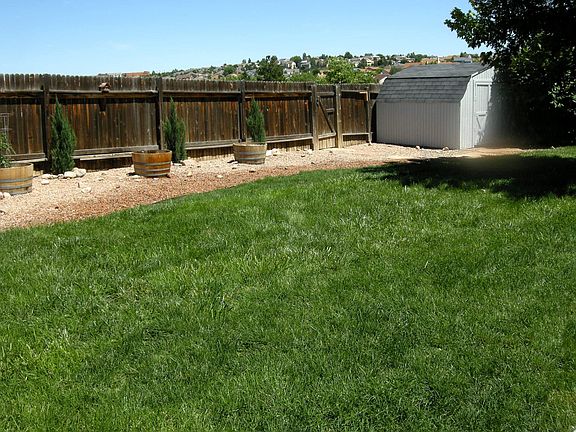 Easy Maintenance Backyard with Storage Shed