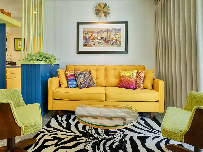 TV den with vintage swivel chairs.