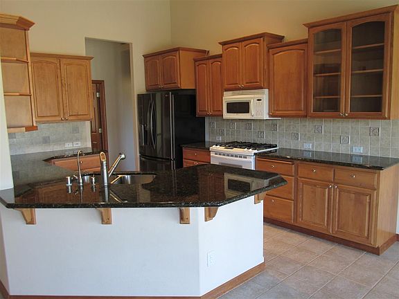 5th image of 13025 E 37th Ct