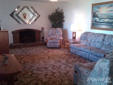 Spacious Living with brick fire place