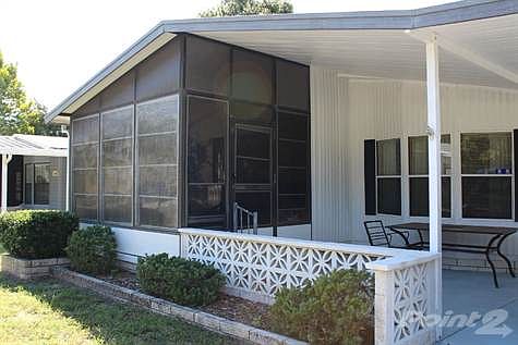 FRONT ENTRANCE TO FLORIDA ROOM