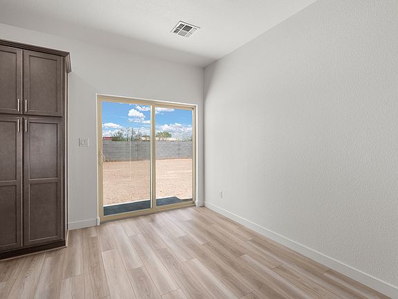 Beautiful sliding glass doors fill the space with natural light.