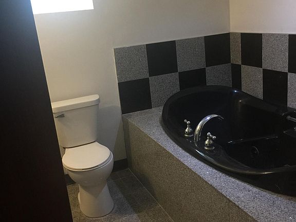 Very large second bathroom with jacuzzi and vessel sink
