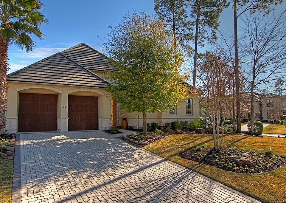 Welcome to 22 Rhapsody Bend, a private patio home on a corner lot in Rhapsody Bend.