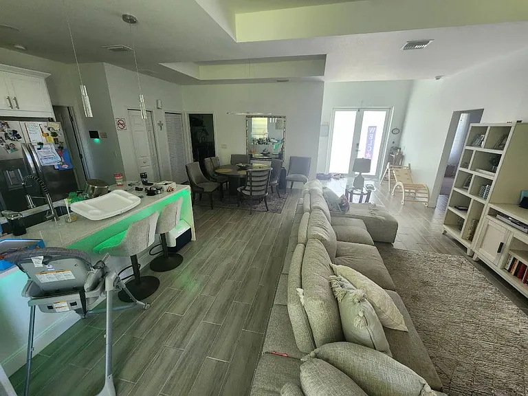 Kitchen, Living Room & Dining Area (Rear View)