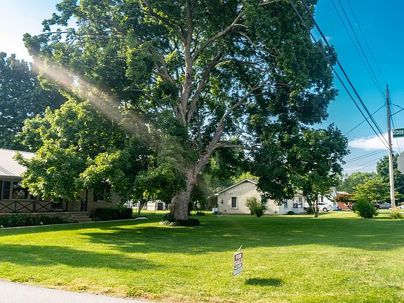 HUGE SHADY CORNER LOT