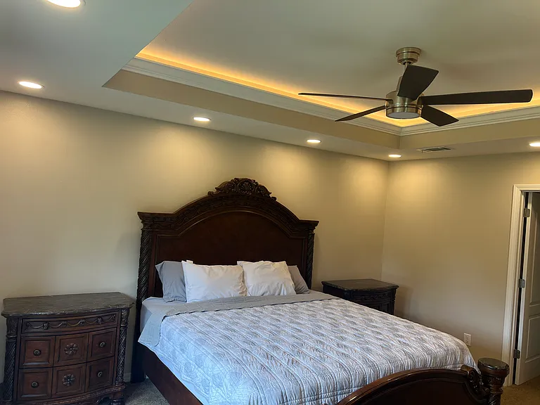 Owner Suite Bedroom with recess, lighting, as well as a coffered lighting in the Crawford ceiling