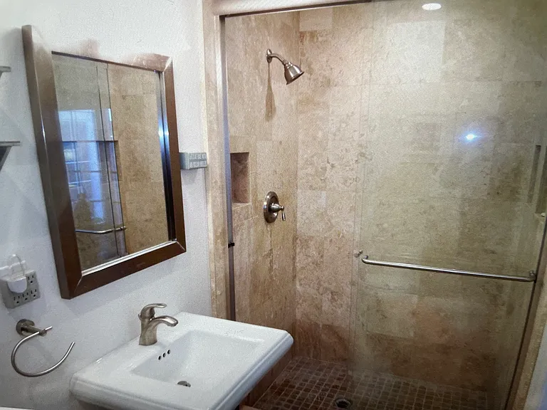 2nd Master Bath with pedestal sink and spacious shower