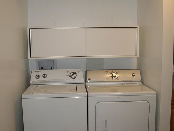 laundry in the kitchen area to the left of the sink
