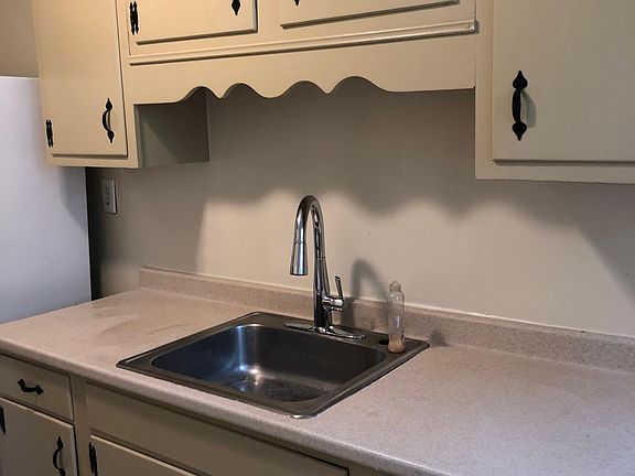 Kitchen cabinets freshly painted.