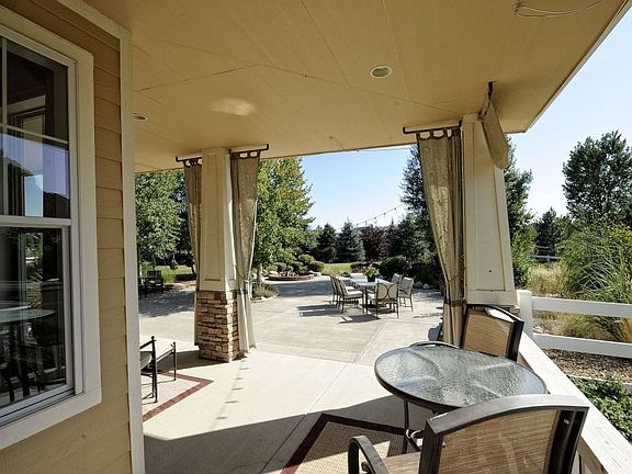 Porch wraps around the home