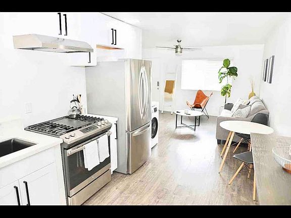 New Kitchen with white Quartz and stainless steel appliances