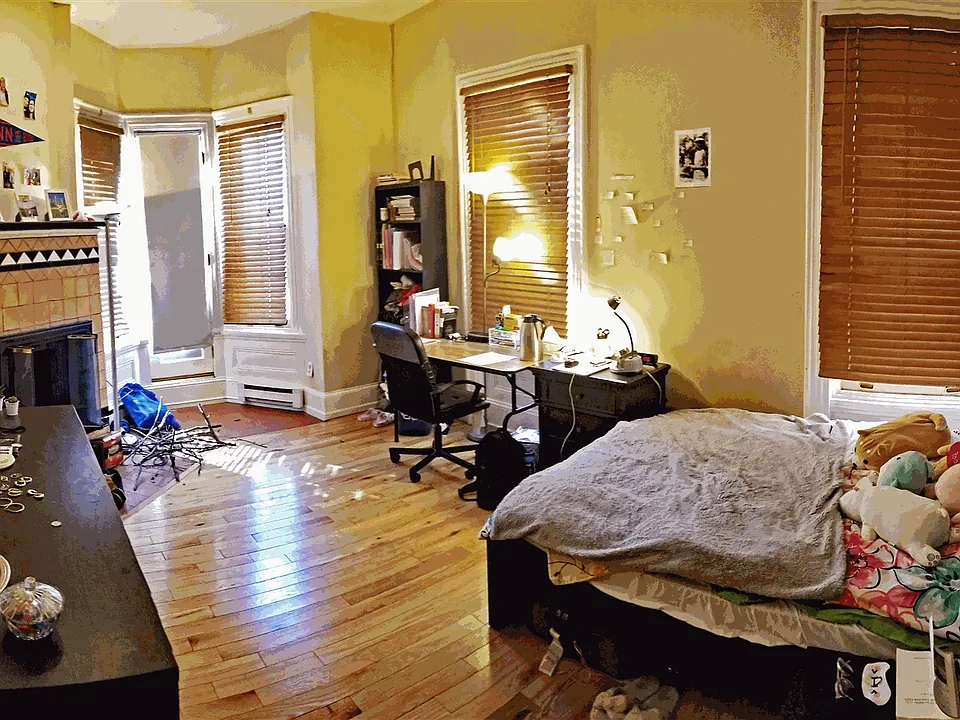 Lower Level Bedroom with Fireplace and Outdoor Deck