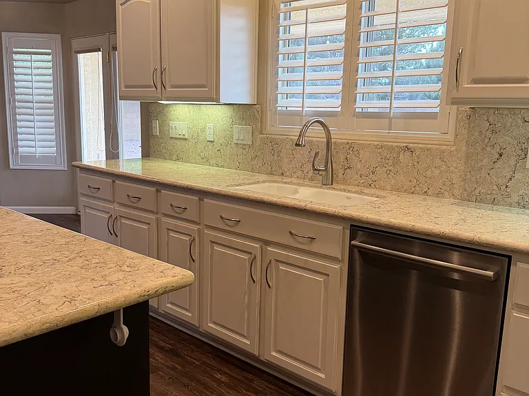 Kitchen with lots of cabinets and under cabinet lighting