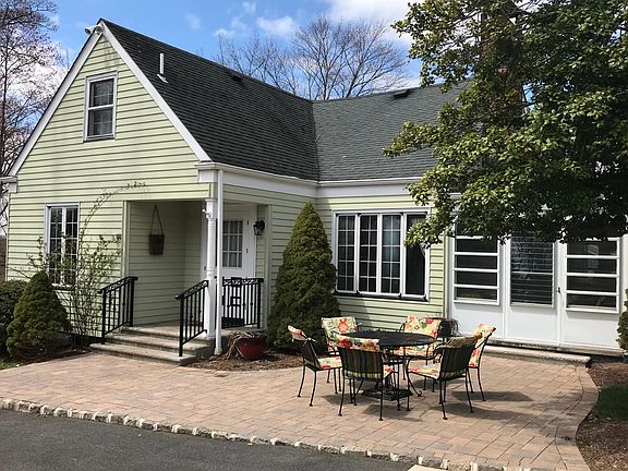 Side entrance, outdoor patio area