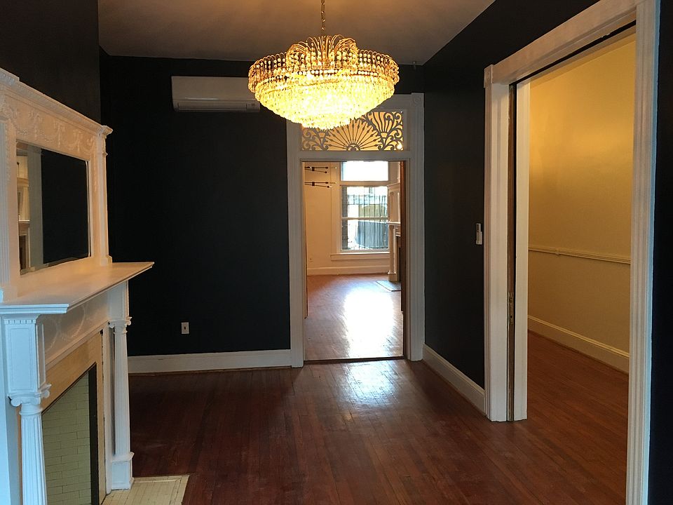 Second living room, with grand chandelier. A parlor, I believe they would have called it in 1870 when the house was built.