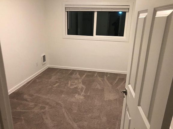 Bedroom with attached closet.