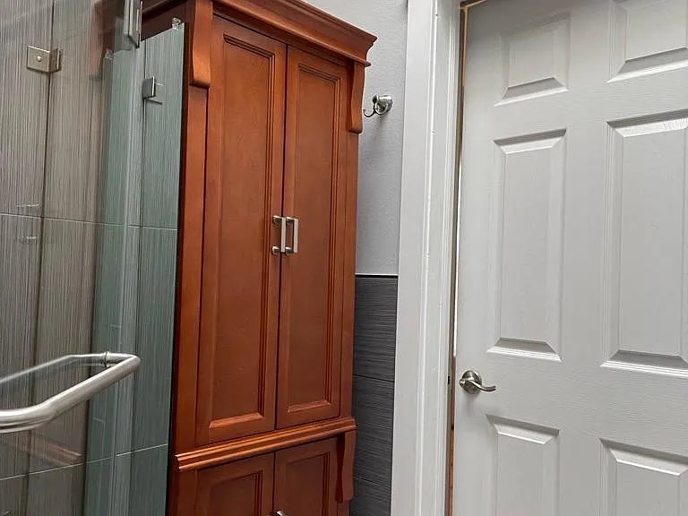 Bathroom w/ Cherry Storage Cabinet