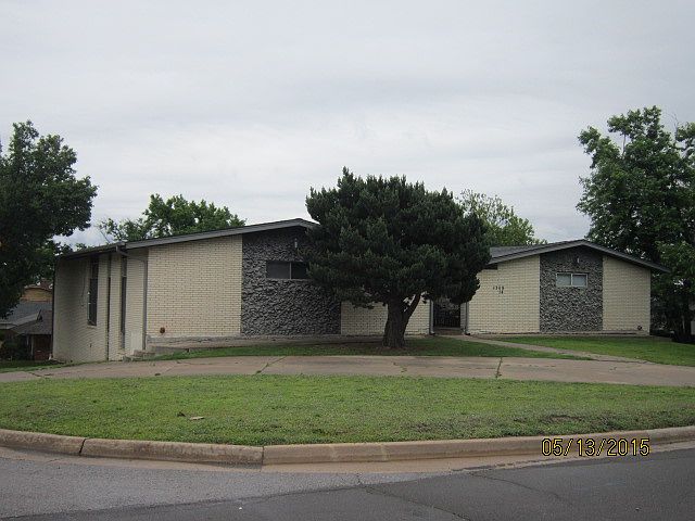 Unit is top floor, street level on Portland Ave. Parking is