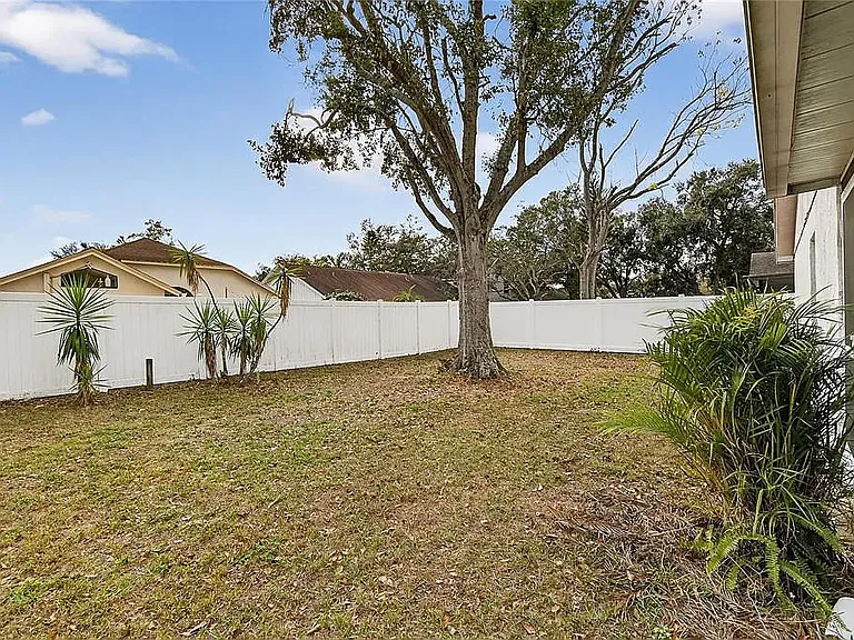 Backyard with fence and screen porch