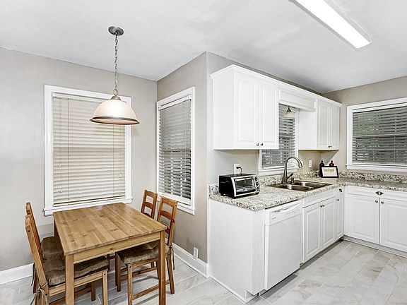 Contemporary kitchen with cozy breakfast nook.