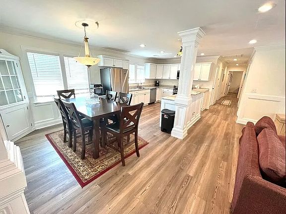 Dining area with table seating 6