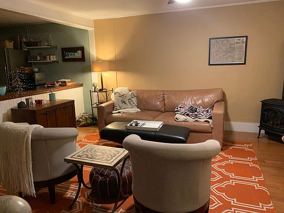 Living room w/gas stove to cozy up for cold winters