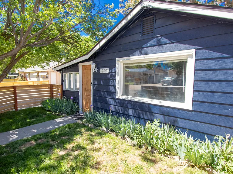 The front yard space is now artificial turf. No maintenance required!