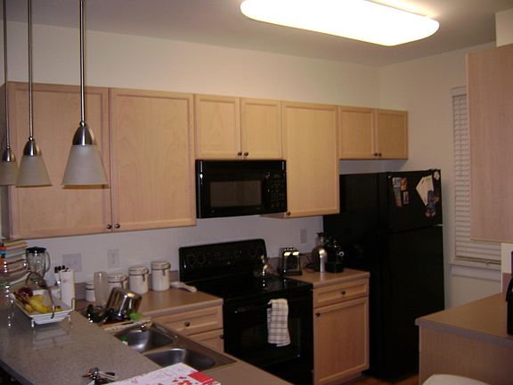 Kitchen, with microwave, dishwasher, and disposal