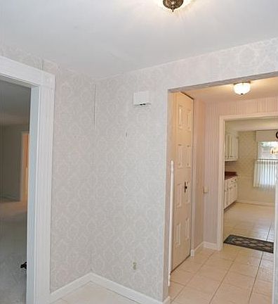 The spacious entry features a large closet