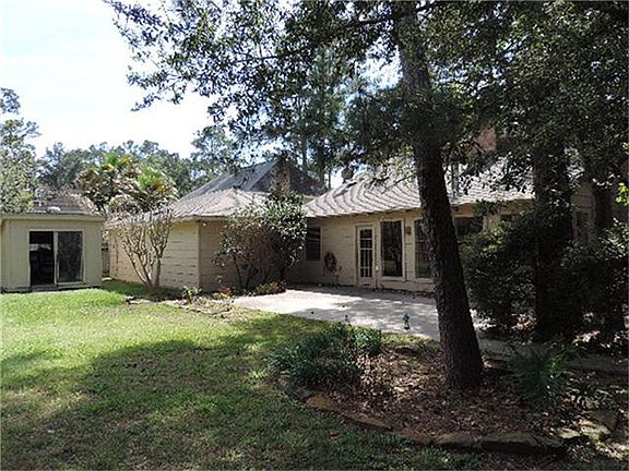 What a great backyard! Large patio, storage shed and plenty of patio left over for play!