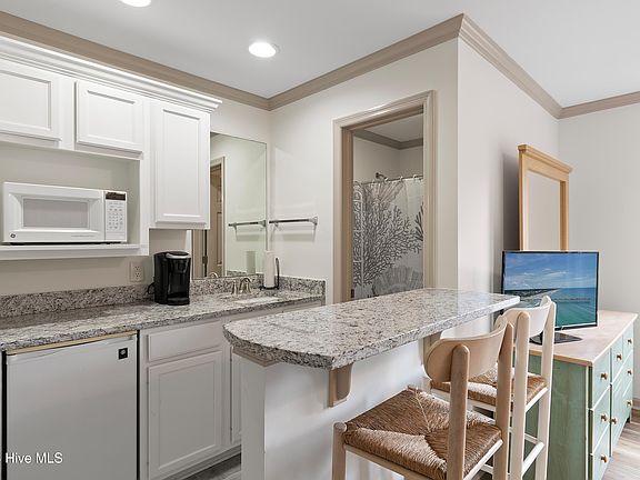 5th image of 3350 Club Villas Dr #904