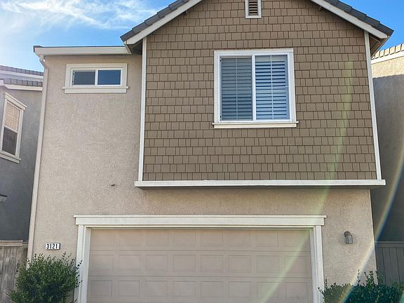 Back View (2-car attached garage) located in ally.