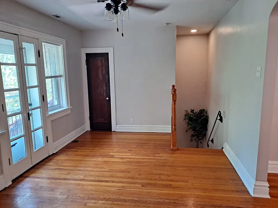 Front living area with access to balcony.