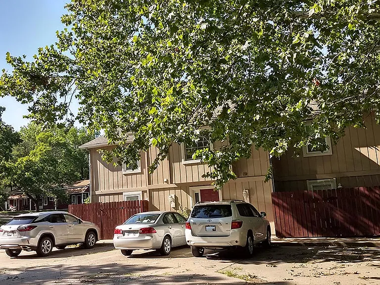 This downstairs unit has 2 off-street parking spaces in front of the unit...