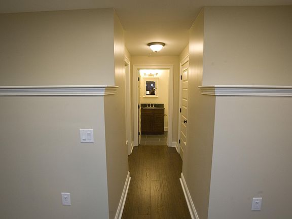 Hall from living room to bathroom, hall closet, and bedroom