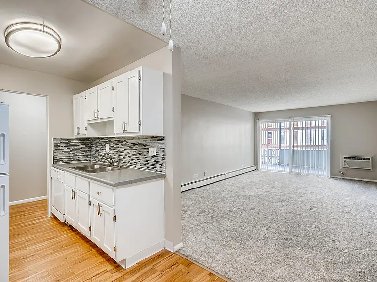 A Standard Living Room and Kitchen at Mondrian Colorado Apartments