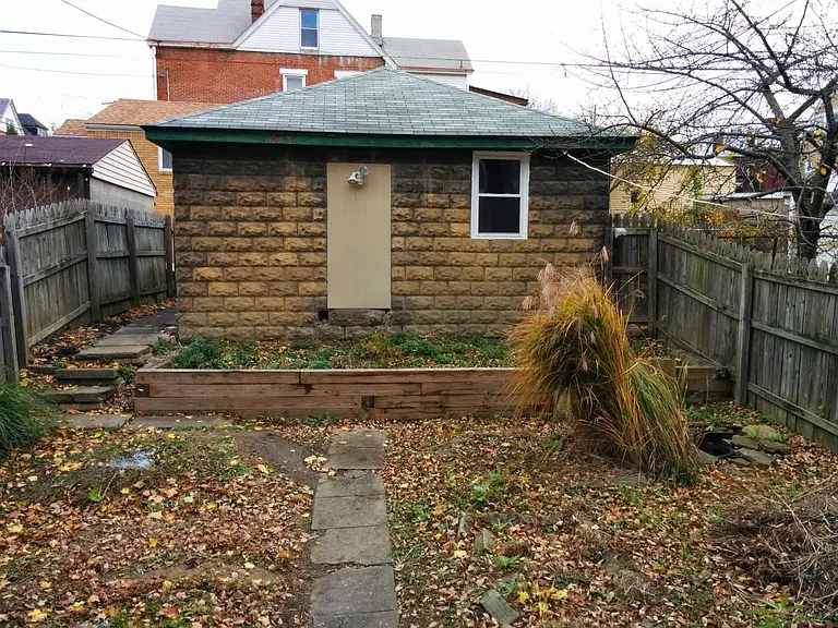 Back yard and two car garage