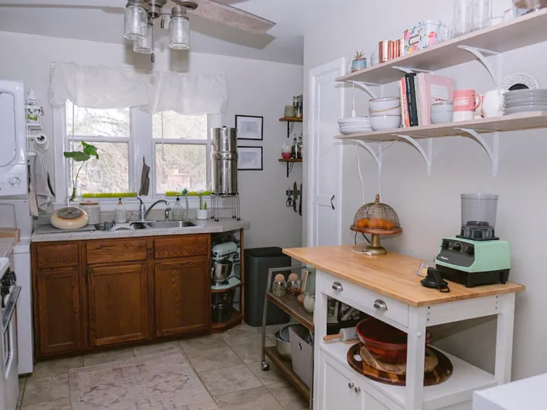 This kitchen is a wonderful space to cook in, lots of light, a walk-in pantry and your own in unit washer and dryer.