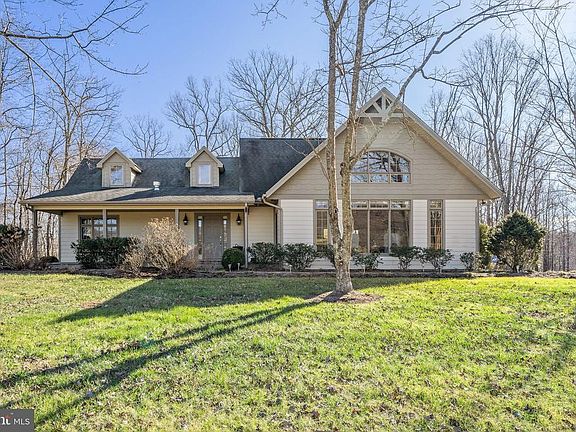 Custom home on 16+ acres, nicely appointed.