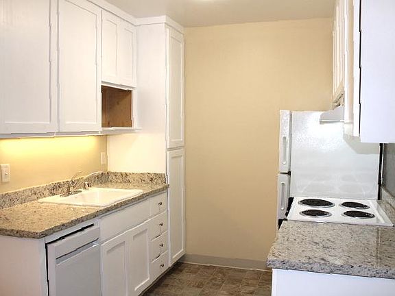 Two Bedroom Apt: The kitchen has new, granite countertops and a new dishwasher.