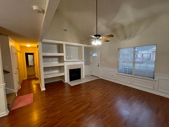 Great room and hallway to second bedroom, second bathroom , laundry closet.