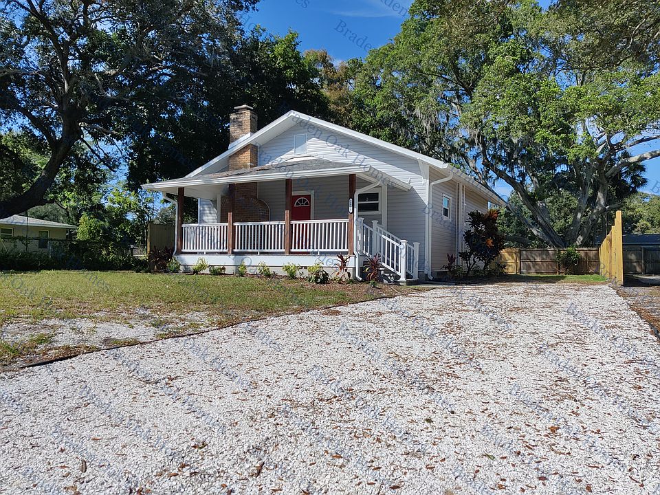 Welcome home! Spacious front porch with 2-car driveway
