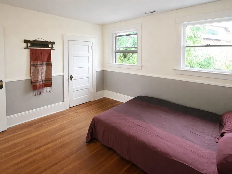 Upstairs South facing bedroom with very deep closet space.